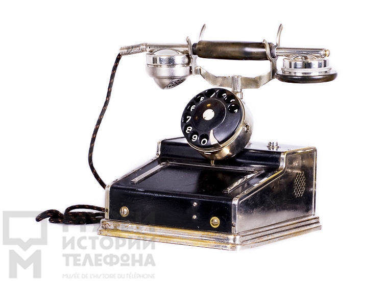 Телефонный аппарат системы АТС в металлическом корпусе с микротелефонной трубкой и поляризованным звонком