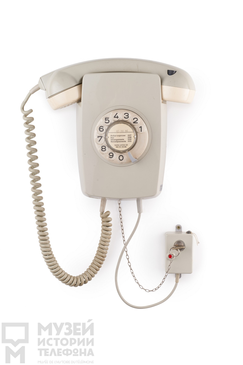 Настенный телефонный аппарат системы АТС с блокиратором и регулятором громкости разговора