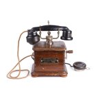 Телефонный аппарат индукторного вызова с микротелефонной трубкой и дополнительным наушником